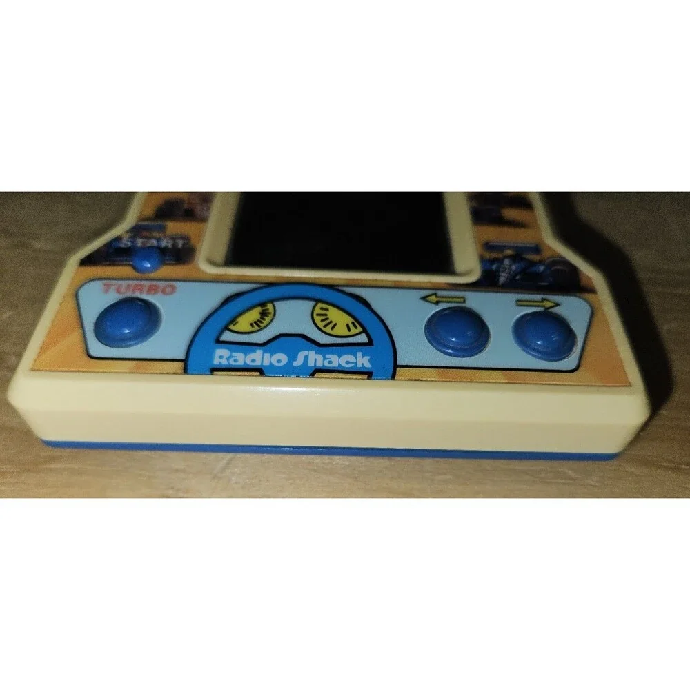 VINTAGE ELECTRONIC HANDHELD TURBO RACEWAY GAME RADIO SHACK TESTED + WORKS